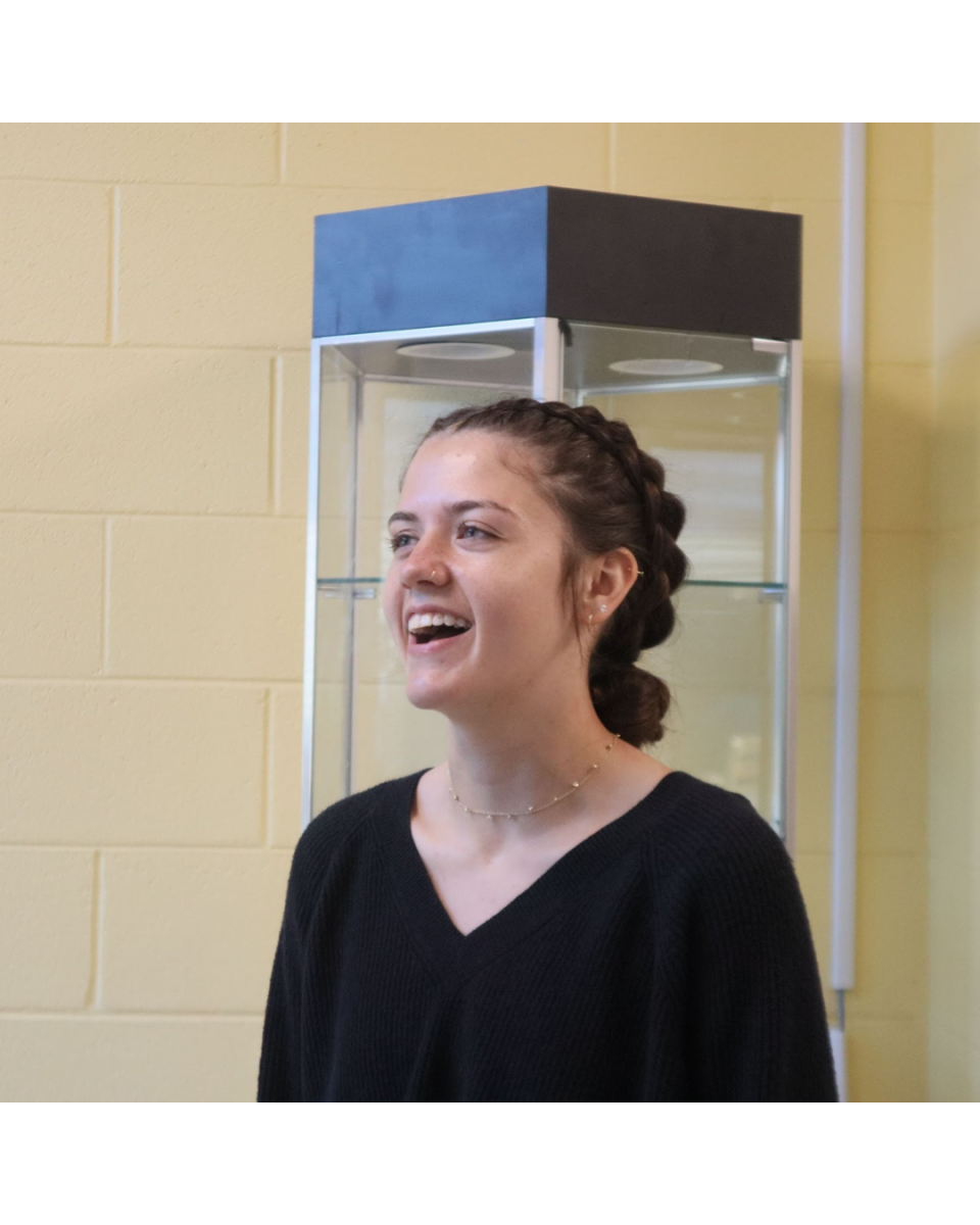 Lily Hix speaks outside the agriculture room about her love for taking care of animals.
