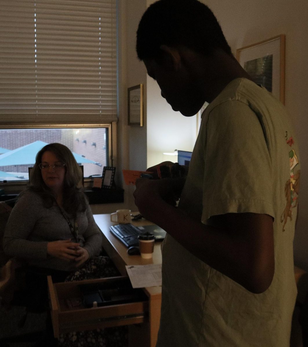Brooks stamping the coffee card for the counselor.