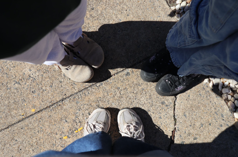 Our trio pauses our downtown adventure to take in the sounds and smells of the morning. 

