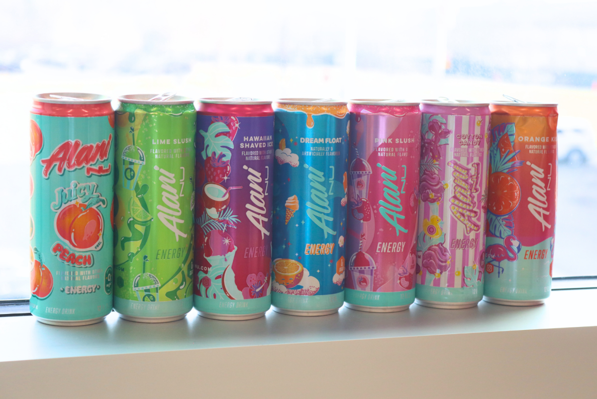 A variety of Alani flavors drank by students lined up against the window outside of the publab.