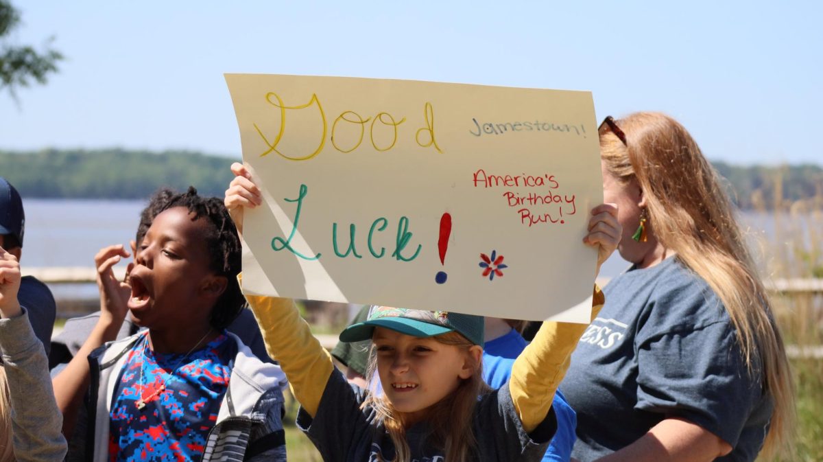 The elementary students welcome Ms. Fletcher with hand-crafted signs.