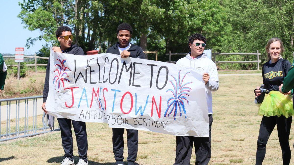 The leadership students hold a sign welcoming Ms. Fletcher to Jamestown.